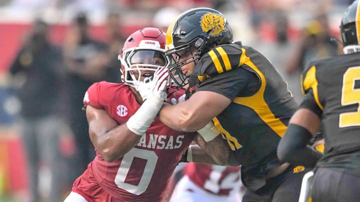 Arkansas Razorbacks defensive lineman Nico Davillier rushing the passer against UAPB in the season opener in Little Rock, Ark.