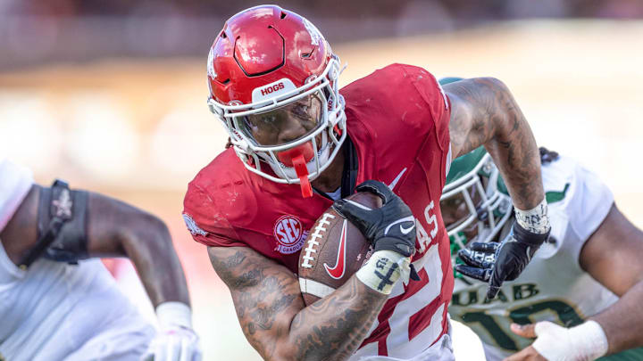 Arkansas Razorbacks running back Ja'Quinden Jackson runs inside against the UAB Blazers at Razorback Stadium in Fayetteville, Ark.