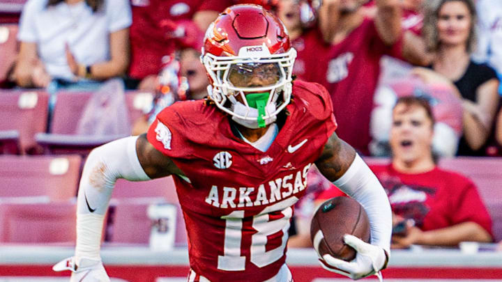 Arkansas Razorbacks defensive back TJ Metcalf returns an interception in the 37-27 win over UAB at Razorback Stadium in Fayetteville, Ark.