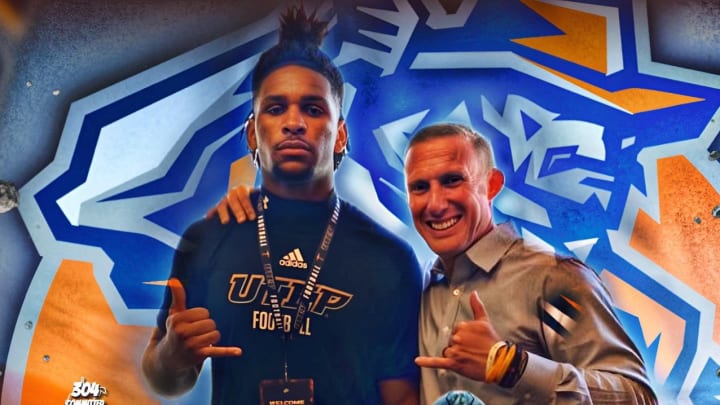 Sachse (Texas) 3-star LB Vashon Brunswick II poses with UTEP coach Scotty Walden on an unofficial visit in late July. 