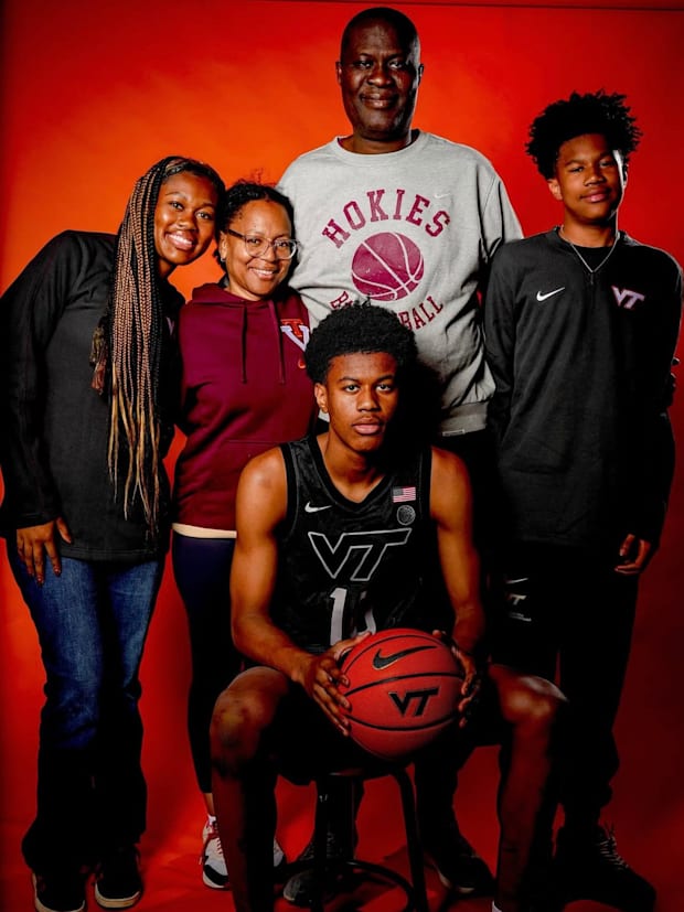 Surrounded by his family, Baba Oladotun (seated) posed for a photo during his official visit to Virginia Tech.