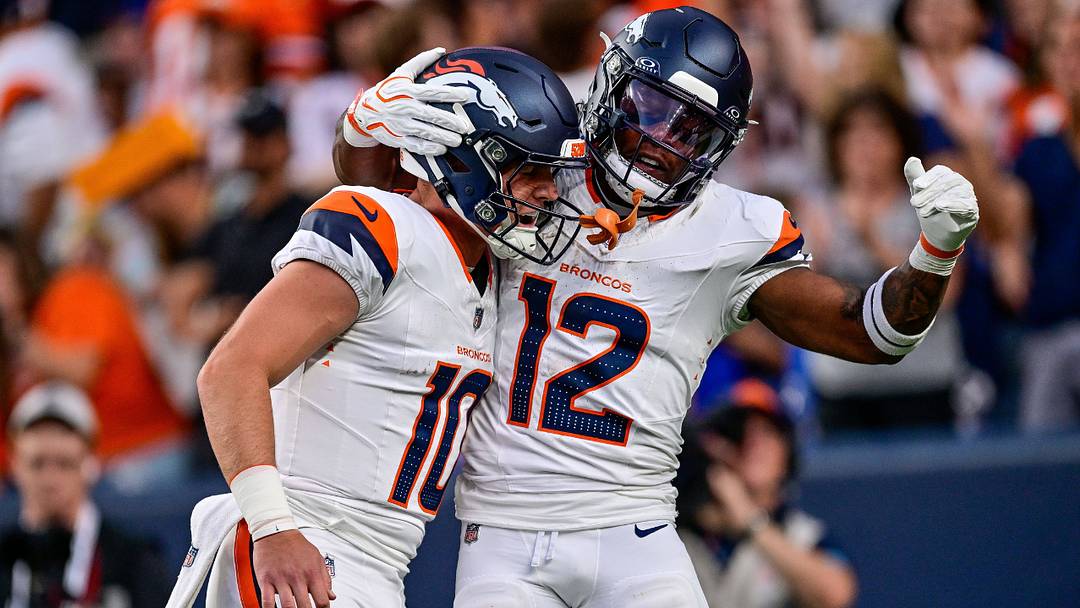 DENVER, CO - AUGUST 21: Denver Broncos quarterback Bo Nix (10) celebrates with running back RJ Harvey (12) after a first-quarter touchdown pass between them during a preseason game against the Green Bay Packers at Empower Field at Mile High on August 21, 2026 in Denver, Colorado. DENVER, CO - AUGUST 21: Denver Broncos quarterback Bo Nix (10) celebrates with running back RJ Harvey (12) after a first-quarter touchdown pass between them during a preseason game against the Green Bay Packers at Empower Field at Mile High on August 21, 2026 in Denver, Colorado.
