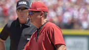 Arkansas Razorbacks coach Dave Van Horn delivering the lineup card before Sunday's second game against the Tennessee Volunteers in the NCAA Super Regional at Baum-Walker Stadium in Fayetteville, Ark.