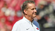 Arkansas Razorbacks coach John Calipari before a football game with the Notre Dame Fighting Irish at Razorback Stadium in Fayetteville, Ark. 
