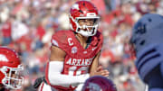 Arkansas Razorbacks quarterback Taylen Green looking over the Mississippi State Bulldogs' defense before a snap in a game at Razorback Stadium in Fayetteville, Ark.