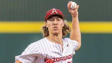 Arkansas Razorbacks pitcher Hagen Smith delivers a pitch Saturday night against Kansas State in Fayetteville Regional at Baum-Walker Stadium in Fayetteville, Ark.