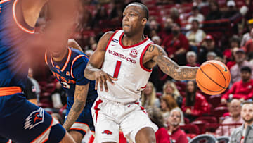 Arkansas Razorbacks guard Johnell Davis throws a pass against Texas-San Antonio in Hogs' 75-60 win at Bud Walton Arena in Fayetteville, Ark.