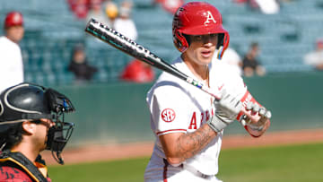 Arkansas Razorbacks designated hitter Kuhio Aloy looks at a pitch against the Louisiana-Monroe Warhawks at Baum-Walker Stadium in Fayetteville, Ark.