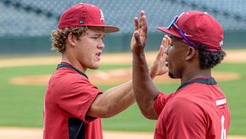Arkansas Razorbacks Cam Kozeal and Justin Thomas, Jr., during practice for the NCAA Regional against North Dakota State on Friday.