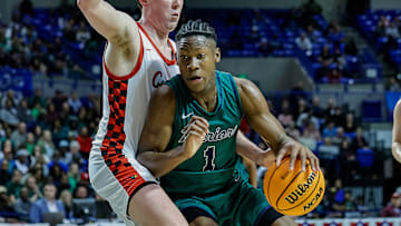 New Arkansas Razorback offer JJ Andrews from Little Rock Christian drives in the lane in the Class 4A state championship game in March at Hot Springs against the Farmington Cardinals.
