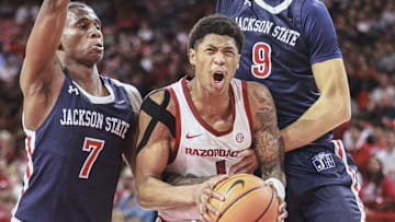 Arkansas Razirbacks forward Meleek Thomas down load against the Jackson State Tigers at Bud Walton Arena in Fayetteville, Ark.