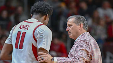 Arkansas Razorbacks guard Karter Knox talks with coach John Calipari on the sidelines against the Fresno State Bulldogs at Simmons Bank Arena in North Little Rock, Ark.