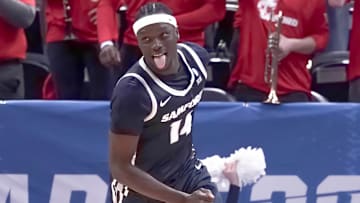Samford Bulldogs forward Achor Achor (14) reacts after a basket during the second half in the first round of the 2024 NCAA Tournament against the Kansas Jayhawks at Vivint Smart Home Arena-Delta Center.