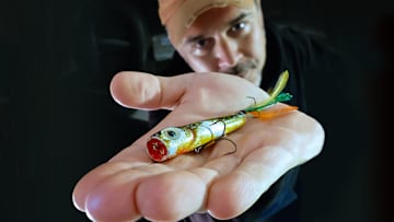 The author with a well-worn bullfrog-colored Chug Bug lure, known as ‘Money’.