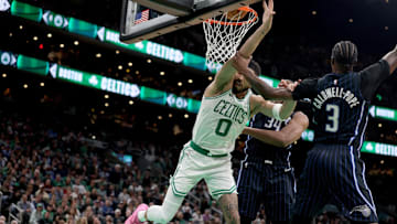 Boston's Jayson Tatum is fouled by Orlando's Kentavious Caldwell-Pope in Game 1 of their first-round NBA playoff series.