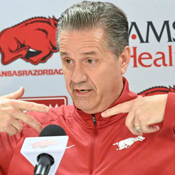 Arkansas Razorbacks coach John Calipari gestures during first press conference on April 10.