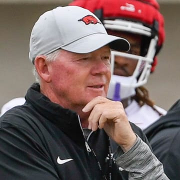 Arkansas Razorbacks offensive coordinator Bobby Petrino watching offense in drills at camp practice on Aug. 7, 2024, in Fayetteville, Ark.