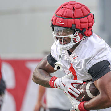 Arkansas Razorbacks' running back Keshawn Davila during drills at the team's first fall practice in Fayetteville, Ark.