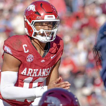 Arkansas Razorbacks quarterback Taylen Green looking over the Mississippi State Bulldogs' defense before a snap in a game at Razorback Stadium in Fayetteville, Ark.