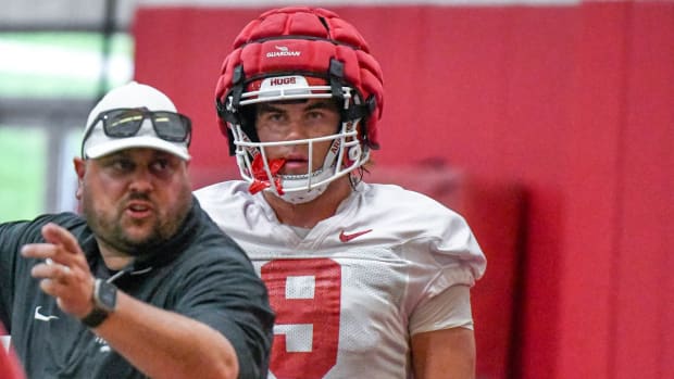 Razorbacks tight end Luke Hasz with tight ends coach Morgan Turner.