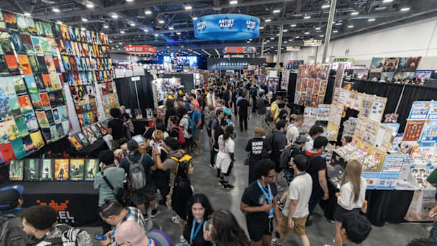 Players walking around artist alley at Evo 2024