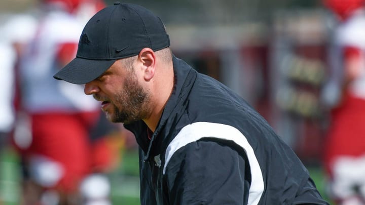 Arkansas Razorbacks tight ends coach Morgan Turner leads his group during a spring practice in 2023.