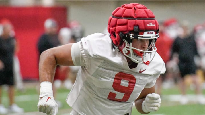 Arkansas Razorbacks tight end Luke Hasz runs a pass route at practice indoors in Fayetteville, Ark.