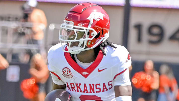 Arkansas Razorbacks wide receiver Andrew Armstrong turns up field after making a catch against Oklahoma State.