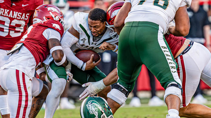 Arkansas Razorbacks defensive lineman Landon Jackson drives to UAB Blazers quarterback Jacob Zen at Razorback Stadium in Fayetteville, Ark.