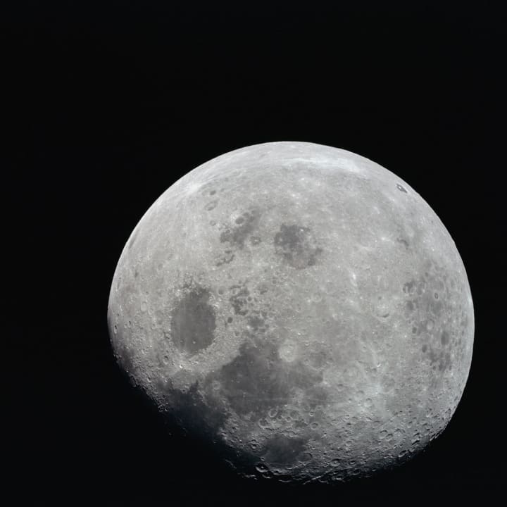 A black and white photo of the moon from the Apollo 8 mission in 1968