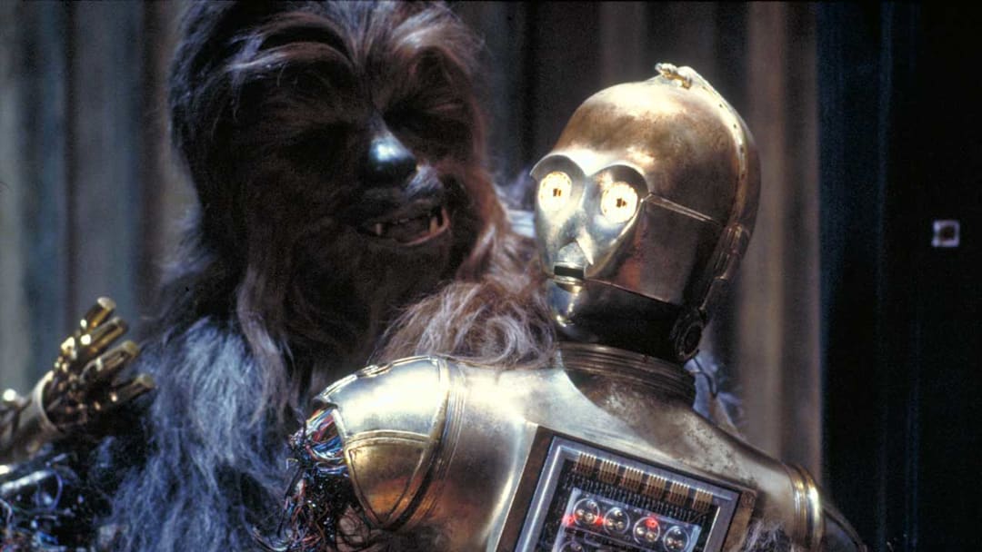 Star Wars: Episode V - The Empire Strikes Back. C-3PO played by Anthony Daniels on Cloud City with Chewbacca (Peter Mayhew). Image Credit: StarWars.com