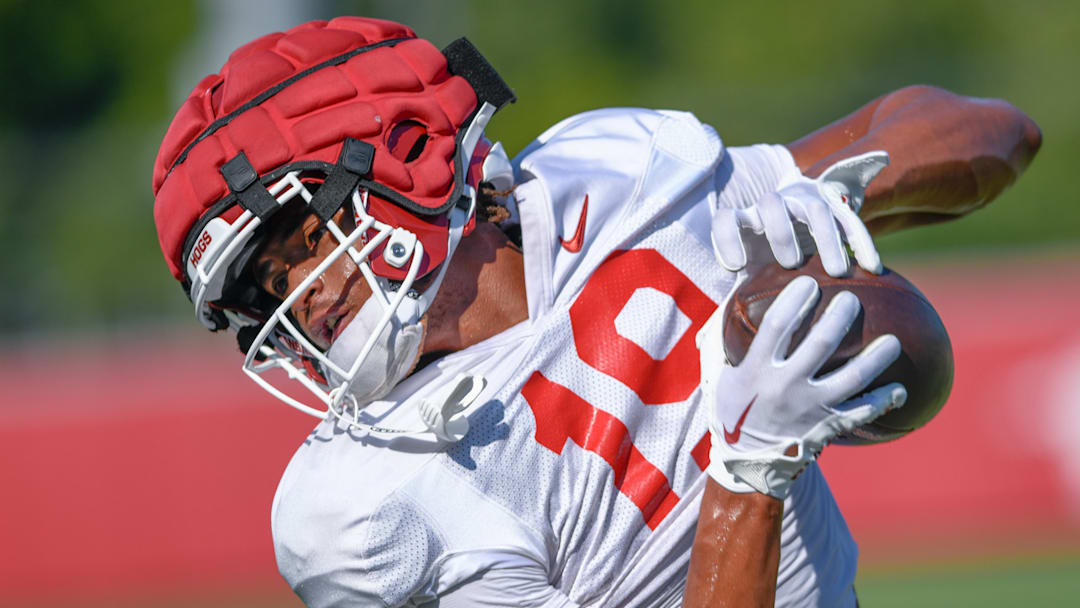 Arkansas Razorbacks wide receiver Antonio Jordan making a catch in preseason drills on the outdoor fields in Fayetteville, Ark.