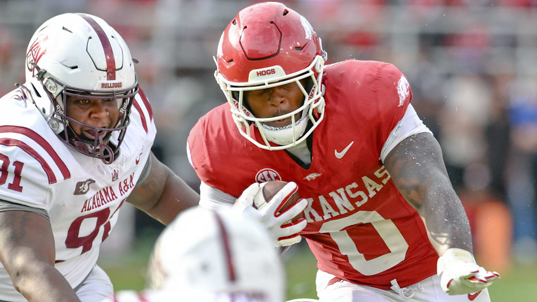 Arkansas Razorbacks running back Braylen Russell on a carry against the Alabama A&M Bulldogs at Razorback Stadium in Fayetteville, Ark. Arkansas Razorbacks running back Braylen Russell on a carry against the Alabama A&M Bulldogs at Razorback Stadium in Fayetteville, Ark.