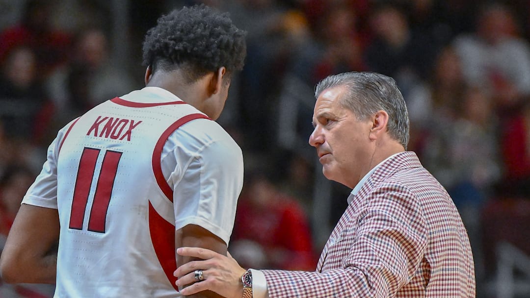 Arkansas Razorbacks guard Karter Knox talks with coach John Calipari on the sidelines against the Fresno State Bulldogs at Simmons Bank Arena in North Little Rock, Ark.