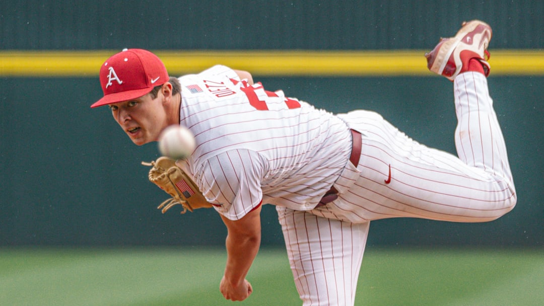 Arkansas Razorbacks pitcher Hunter Dietz throws against UT Arlington.