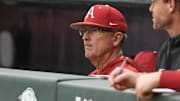 Arkansas Razorbacks coach Dave Van Horn in the dugout against Oral Roberts at Baum-Walker Stadium in Fayetteville, Ark.