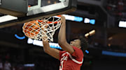 Arkansas Razorbacks guard Karter Knox drives for a layup against the Texas Tech Red Raiders in the Sweet 16.