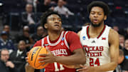 Arkansas Razorbacks guard Karter Knox drives for a layup against the Texas Tech Red Raiders in the Sweet 16.