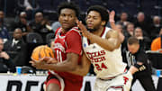 Arkansas Razorbacks guard Karter Knox drives for a layup against the Texas Tech Red Raiders in the Sweet 16.