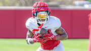 Arkansas Razorbacks wide receiver Ismael Cisse makes a catch during drills at spring practice on the outdoor practice fields in Fayetteville, Ark.