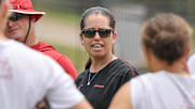 Arkansas Razorbacks coach Courtney Deifel addresses the team after practice Thursday for the Super Regional on Friday against the Ole Miss Rebels at Bogle Park in Fayetteville, Ark.