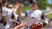 Arkansas Razorbacks first baseman Bri Ellis coming off the field against the Oklahoma State Cowgirls in an NCAA Regional at Bogle Park in Fayetteville