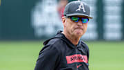 Arkansas Razorbacks coach Dave Van Horn watching practice before the NCAA Regional in Fayetteville at Bogle Park.