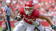 Arkansas Razorbacks wide receiver CJ Brown breaking a tackle against the Alabama A&M Bulldogs at Razorback Stadium in Fayetteville, Ark.