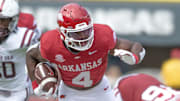 Arkansas Razorbacks running back Mike Washington runs against the Alabama A&M Bulldogs at Razorback Stadium in Fayetteville, Ark.
