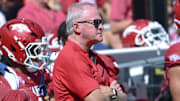 Arkansas Razorbacks athletics director Hunter Yurachek on the sidelines during game with the Notre Dame Fighting Irish at Razorback Stadium in Fayetteville, Ark