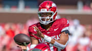 Arkansas Razorbacks quarterback Taylen Green takes a snap from center against the Notre Dame Fighting irish at Razorback Stadium in Fayetteville, Ark.