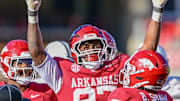 Arkansas Razorbacks defensive lineman Quincy Rhodes after a stop against the Mississippi State Bulldogs at Razorback Stadium in Fayetteville, Ark.