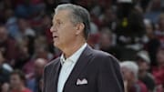Arkansas Razorbacks coach John Calipari on the sidelines against the Winthrop Eagles at Bud Walton Arena in Fayetteville, Ark.