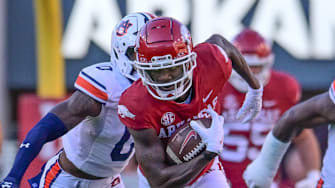 Arkansas Razorbacks wide receiver Andrew Armstrong hauls in a pass from KJ Jefferson against the Auburn Tigers last November in a game at Razorback Stadium in Fayetteville, Ark.